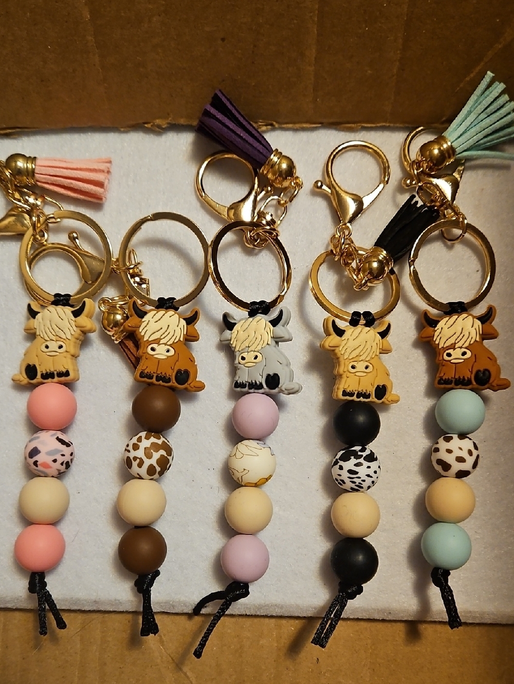 Five Cute Highland Cow Beaded Keychains with Tassel